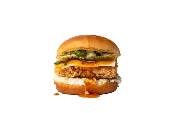 Crispy chicken burger with cheese, lettuce, and sauce